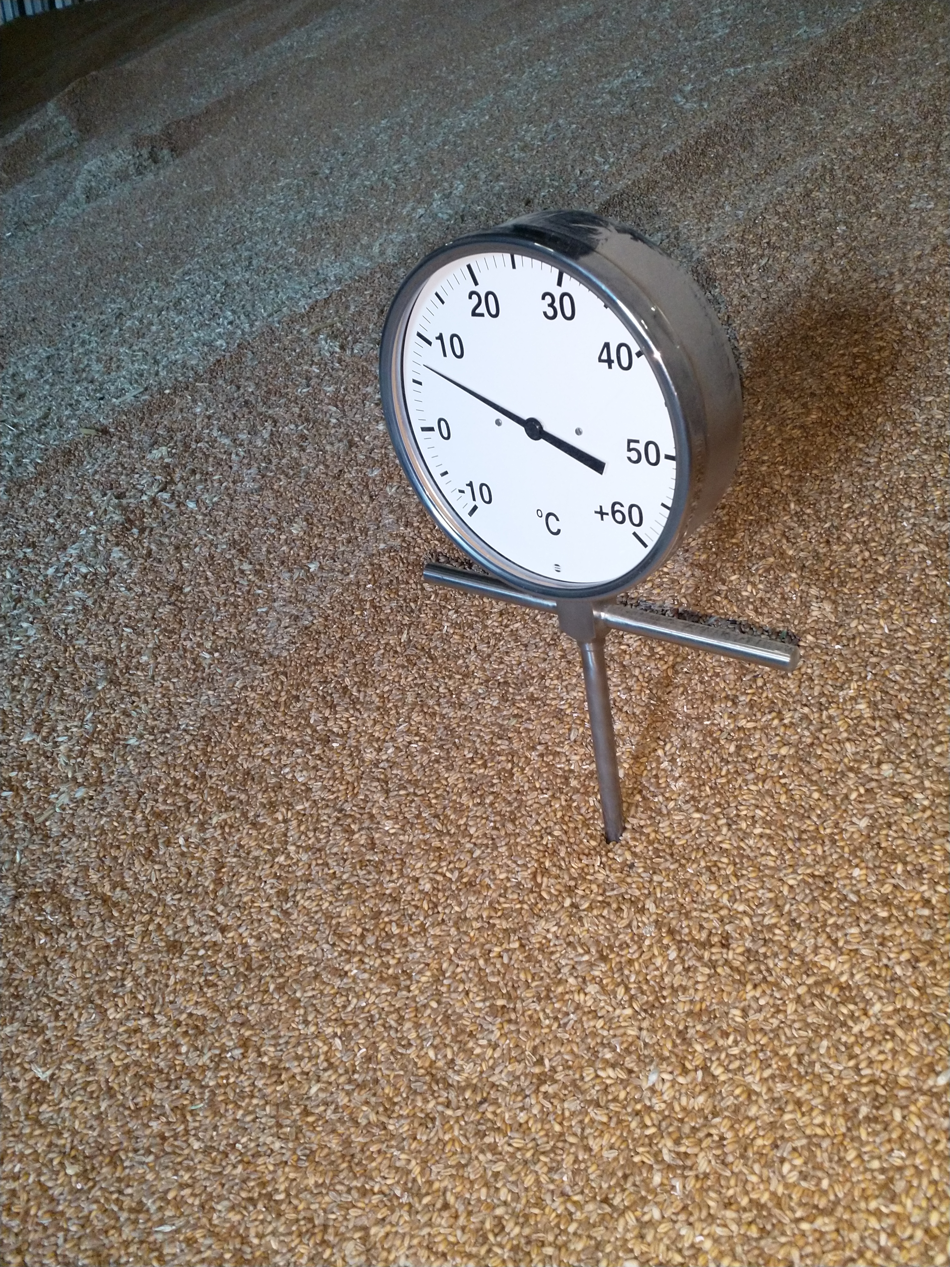 What is the best way to ventilate and dry grain?